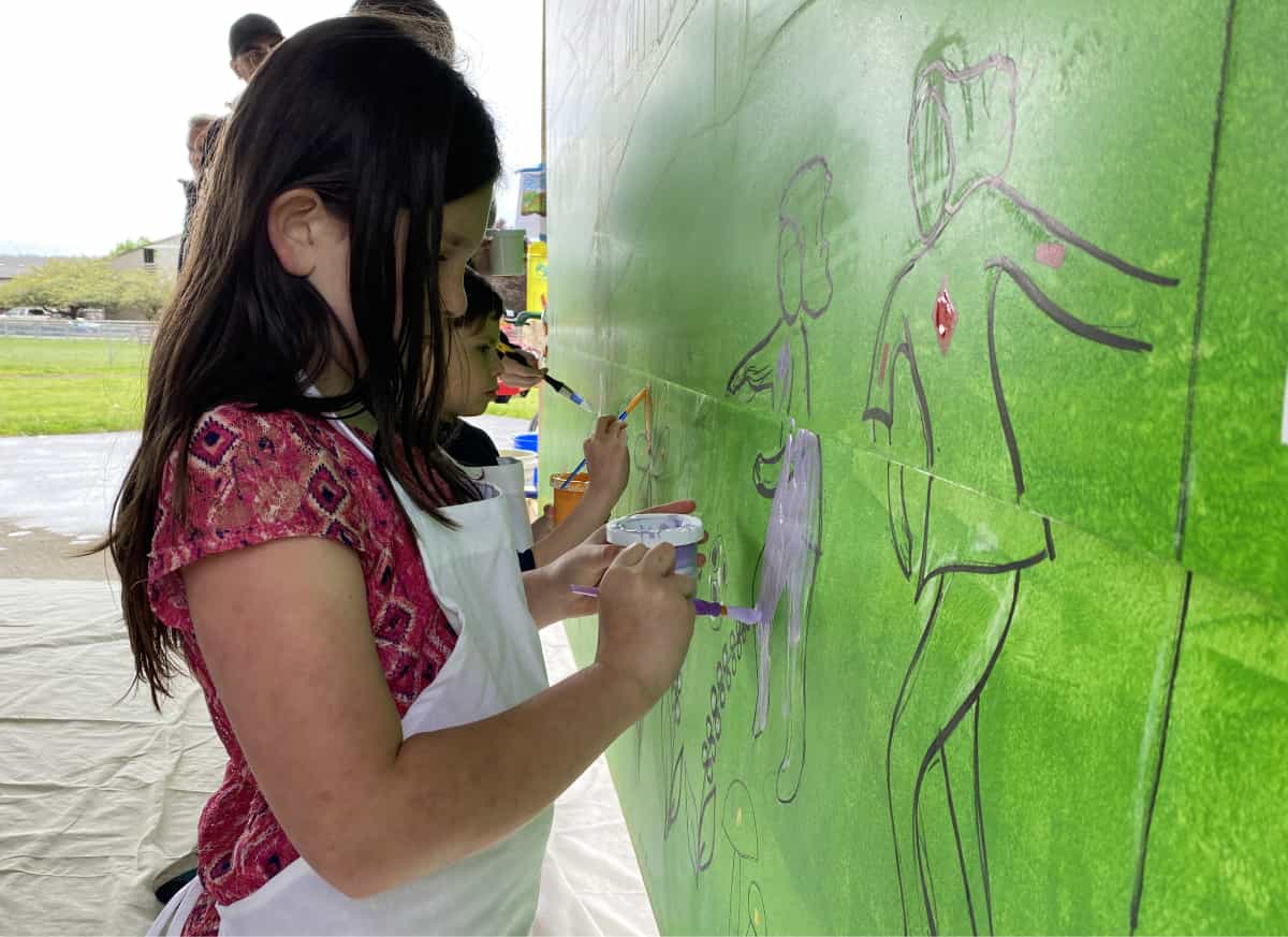 Image of community painting murals in Washougal